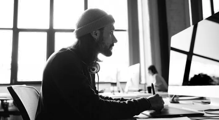 Office worker using Microsoft 365 on a laptop