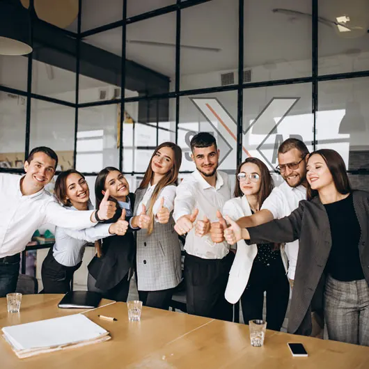 Team celebrating together in an office